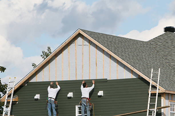 Professional Emergency Siding Repair technician working in Monrovia, IN